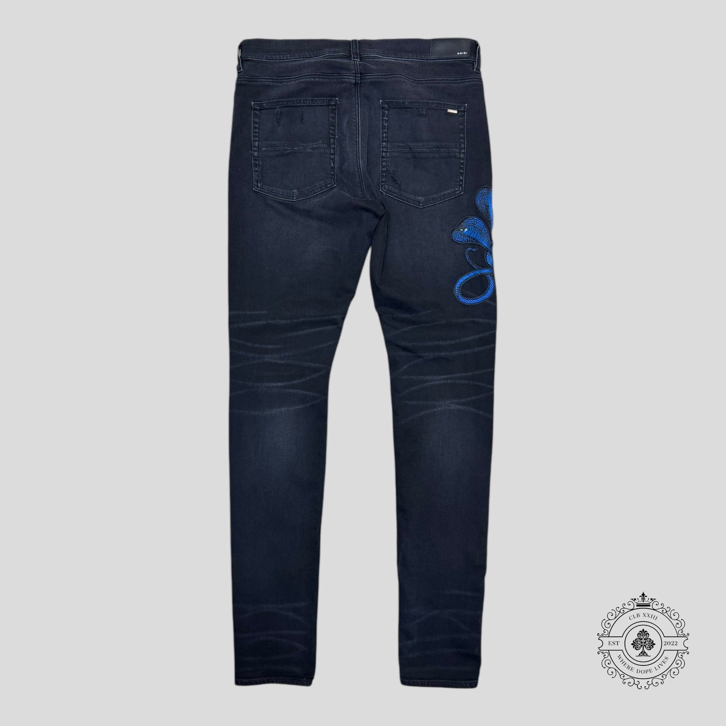 Amiri Blue Poison Archival Skinny Jeans in Black