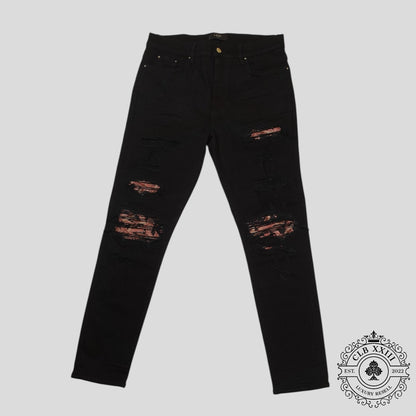 Amiri Banana Leaf Patch Thrasher Jeans in Black