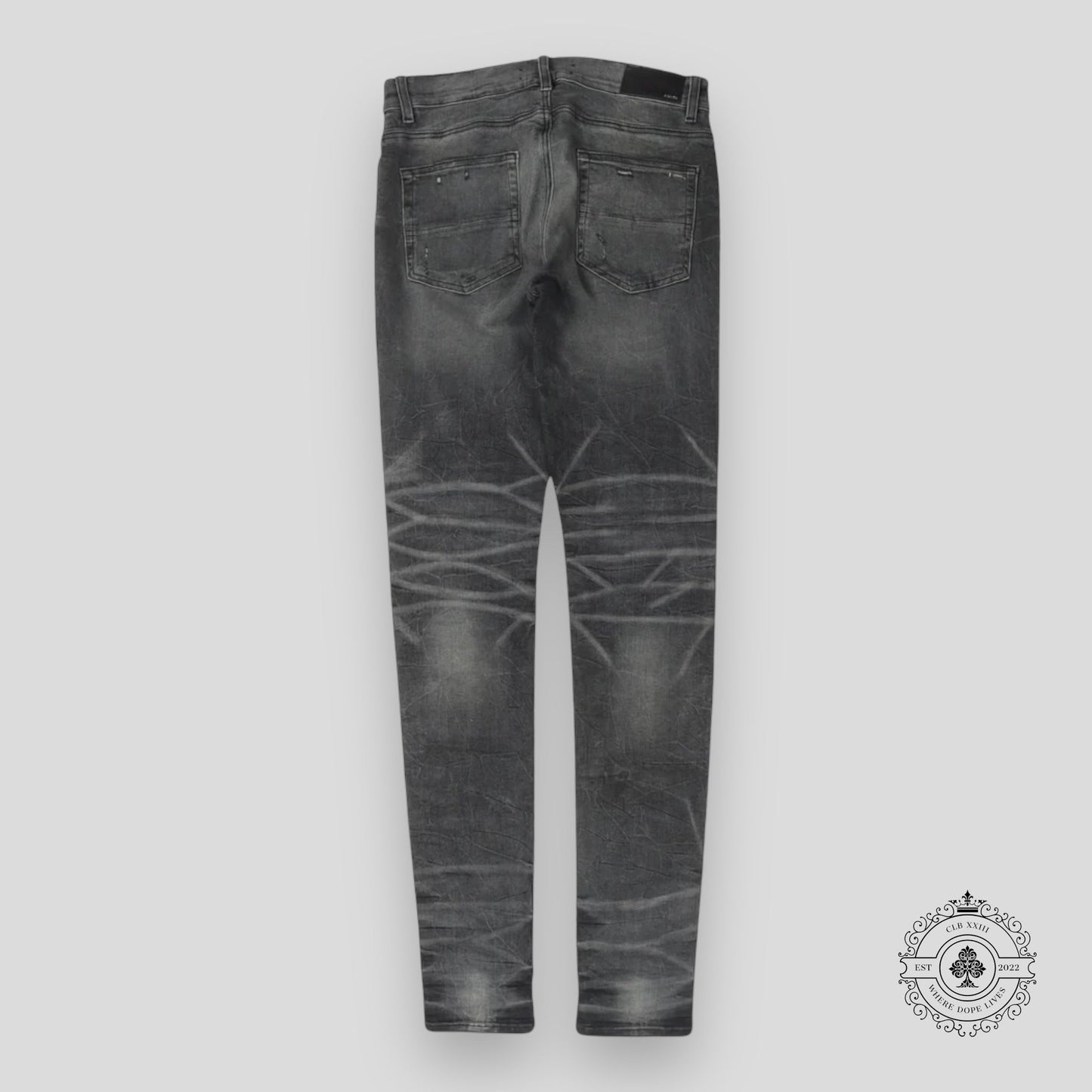 Amiri Faded Denim Jeans in Grey