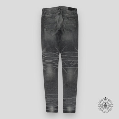 Amiri Faded Denim Jeans in Grey