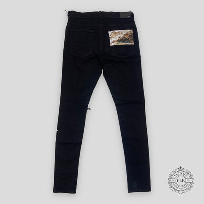 Amiri Hawaiian Star Art Patch Jeans in Black