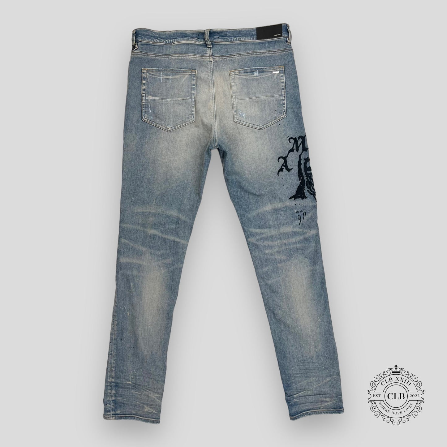 AMIRI X WES LANG REAPER LOGO JEANS - CLAY INDIGO